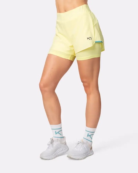 Dámské šortky Kari Traa Mija Training Shorts Mellow Yellow 623764 26/27