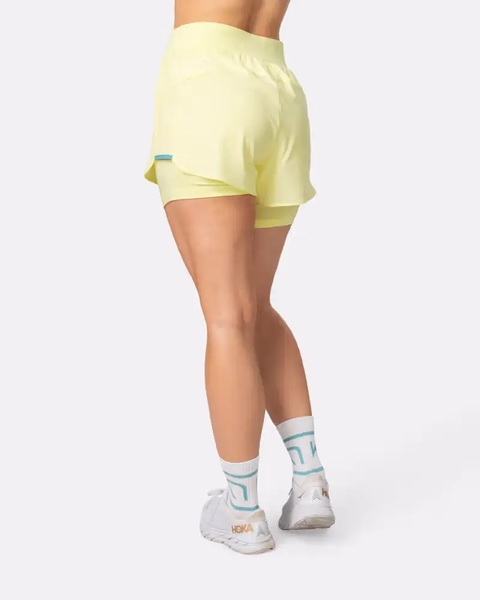 Dámské šortky Kari Traa Mija Training Shorts Mellow Yellow 623764 26/27